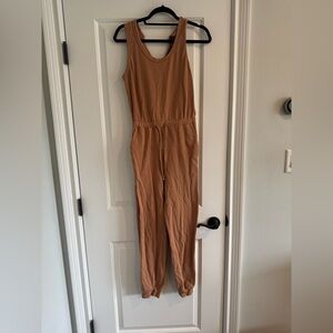 Le Lis Tan Sleeveless Jumpsuit with V-Neck and Relaxed Fit